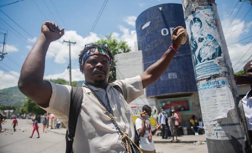 Policía, haitiana, protesta, violencia